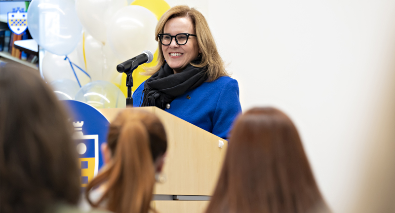 Chancellor Gabel speaking at a podium